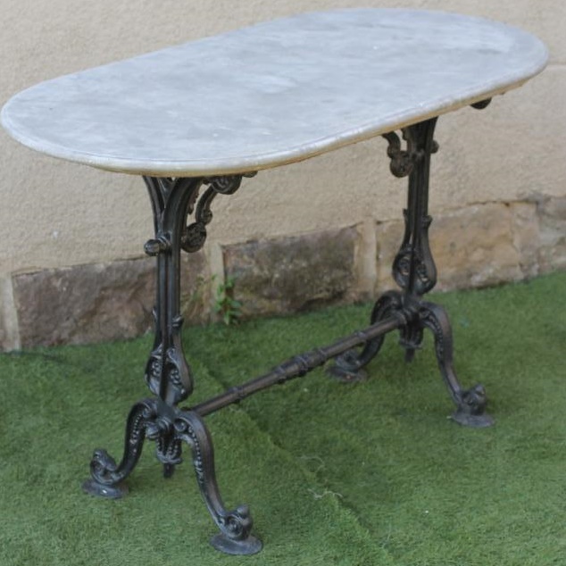A VICTORIAN CAST IRON PUB TABLE of rounded oblong form Image
