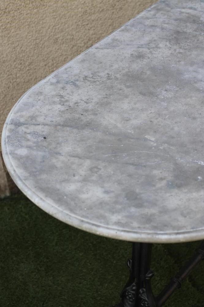 A VICTORIAN CAST IRON PUB TABLE of rounded oblong form Image