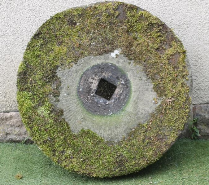 A SANDSTONE MILL WHEEL Image