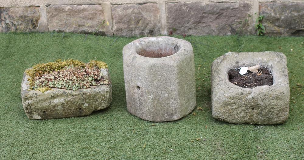 A SMALL SANDSTONE TROUGH of rough hewn oblong form Image