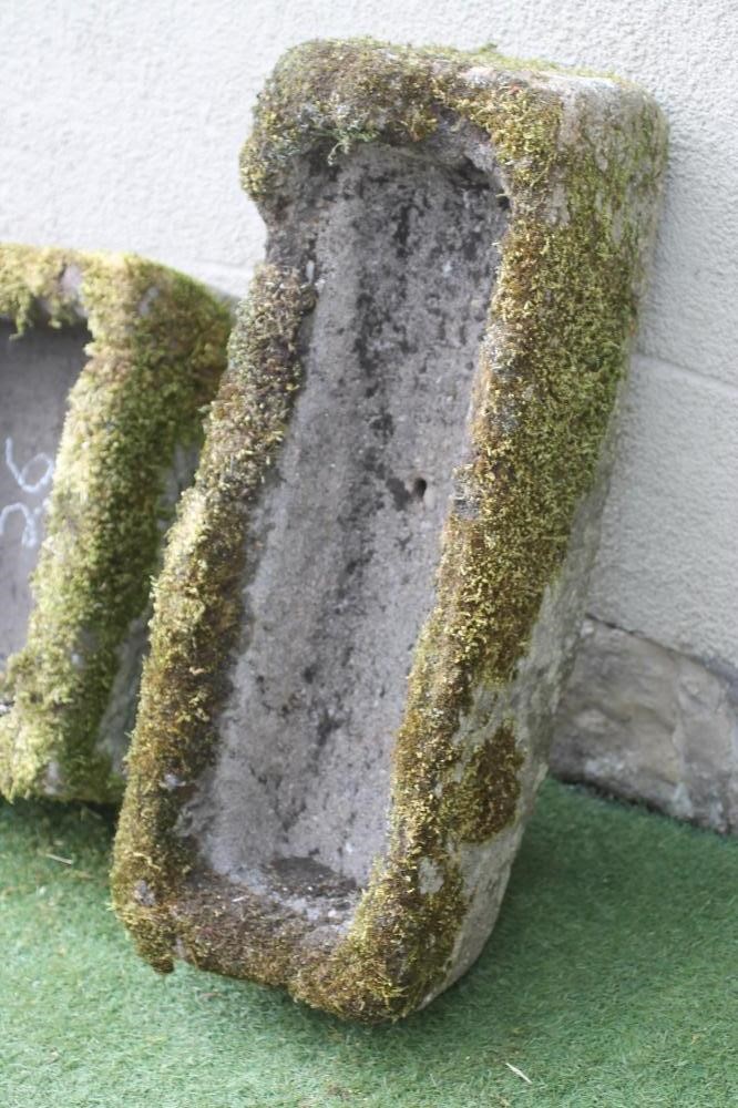 A SMALL SANDSTONE TROUGH of rough hewn oblong form Image