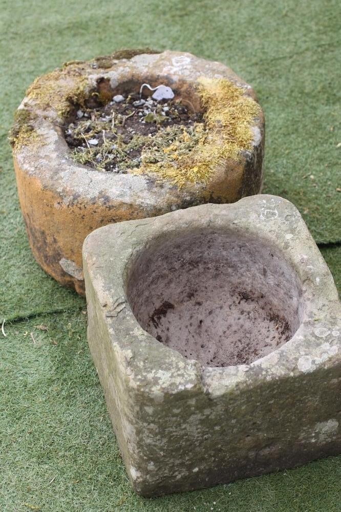 A SANDSTONE TROUGH of cylindrical form with flat rim Image