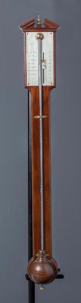 A MAHOGANY STICK BAROMETER Image