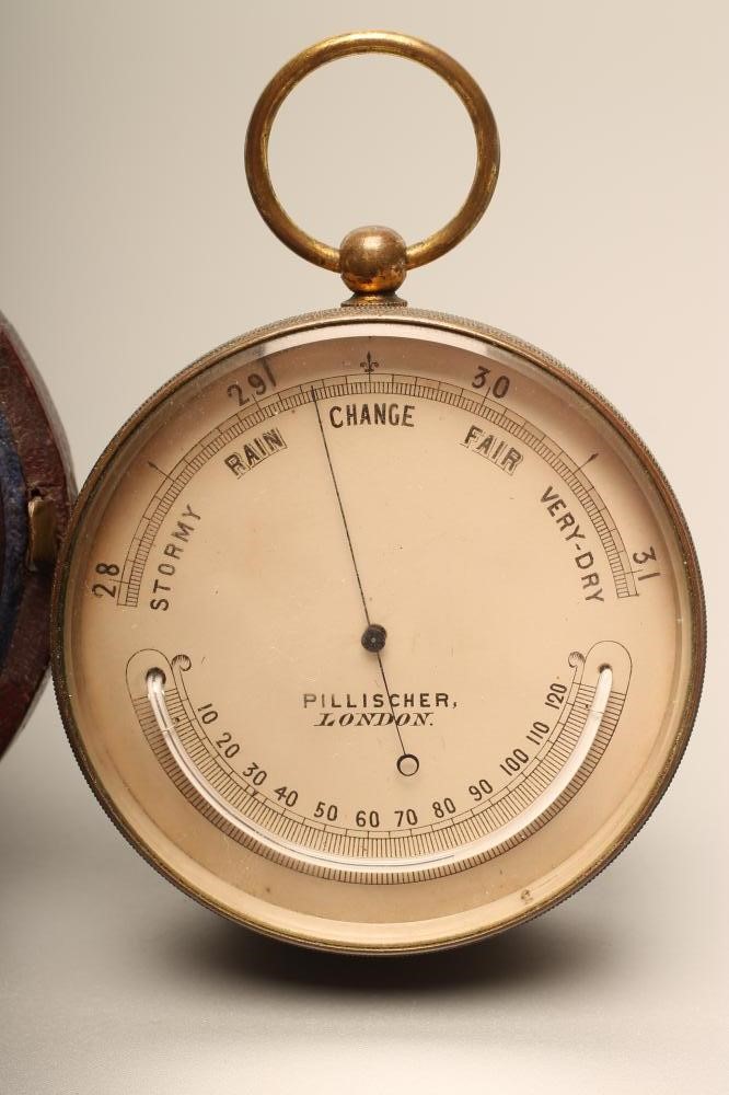 A VICTORIAN LARGE POCKET ANEROID BAROMETER Image