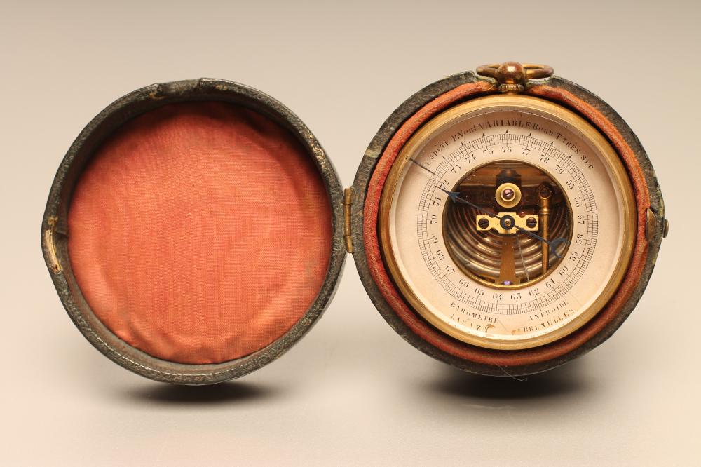 A FRENCH POCKET ANEROID BAROMETER Image