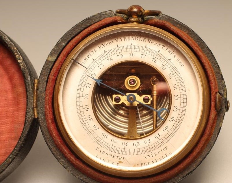 A FRENCH POCKET ANEROID BAROMETER Image