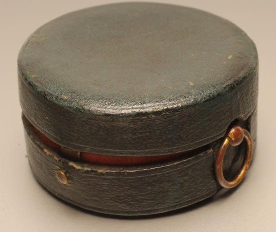 A FRENCH POCKET ANEROID BAROMETER Image