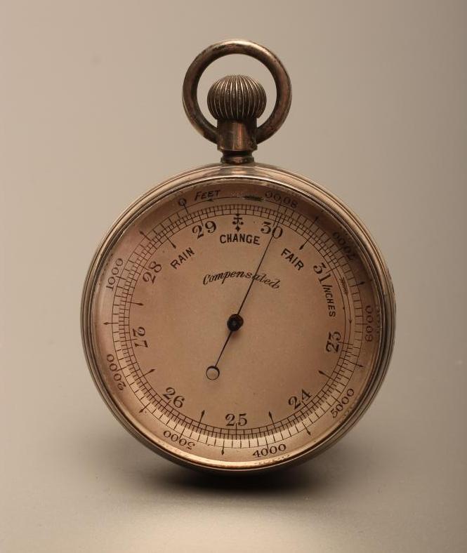 A VICTORIAN POCKET BAROMETER with keyless wind adjuster in engine turned silver case Image