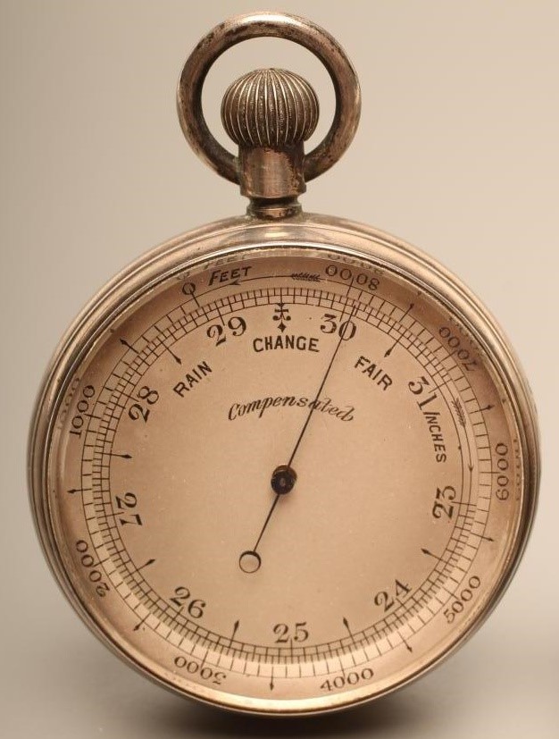 A VICTORIAN POCKET BAROMETER with keyless wind adjuster in engine turned silver case Image