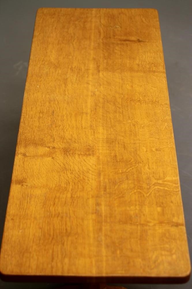 AN ADZED OAK COFFEE TABLE by Robert Thompson Image