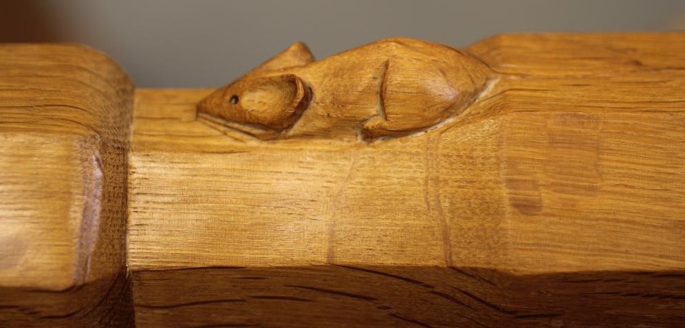 AN ADZED OAK COFFEE TABLE by Robert Thompson Image