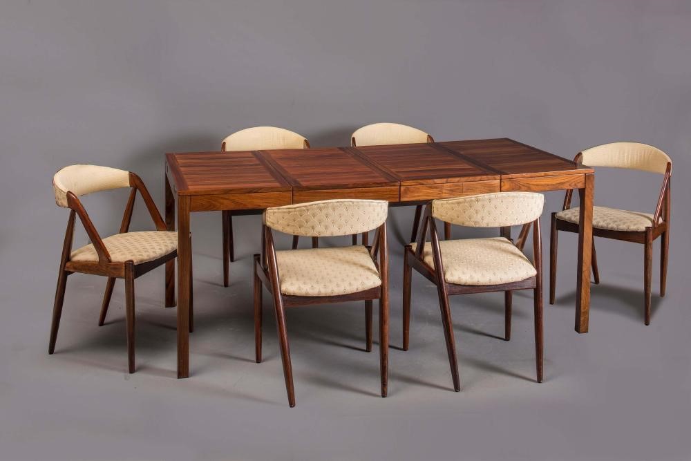 A DANISH ROSEWOOD DINING SUITE by Vejle Stole Møbelfabrik Image