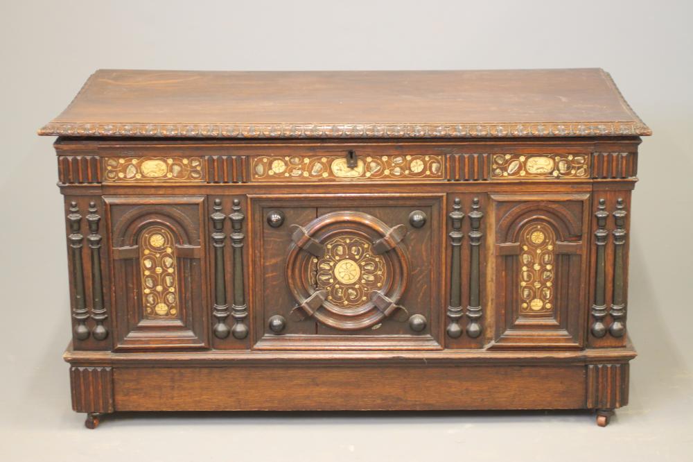 AN OAK AND BONE INLAID PANELLED COFFER Image