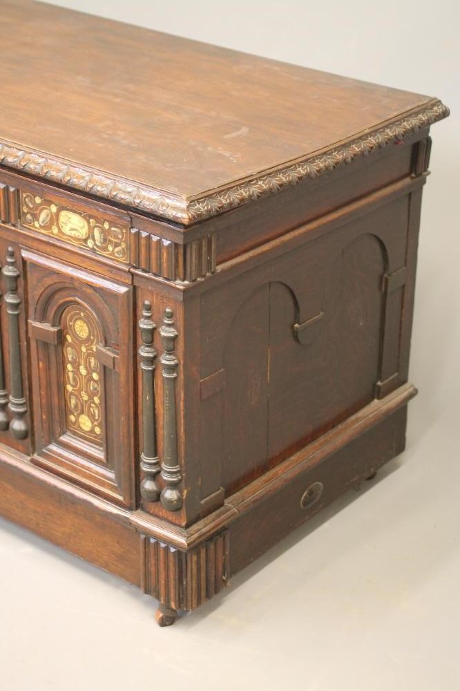 AN OAK AND BONE INLAID PANELLED COFFER Image