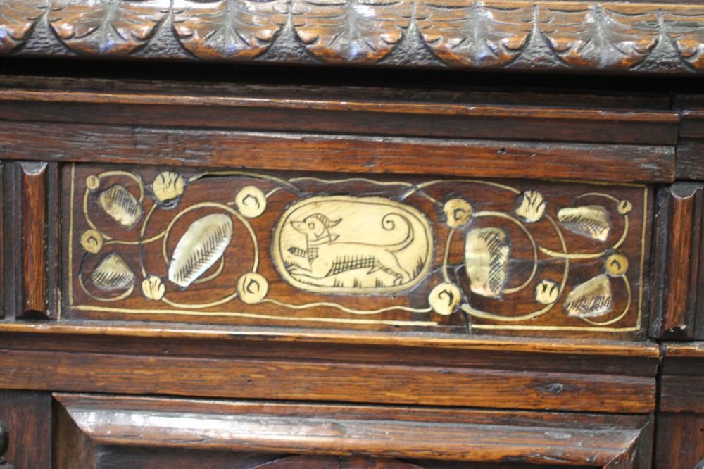 AN OAK AND BONE INLAID PANELLED COFFER Image