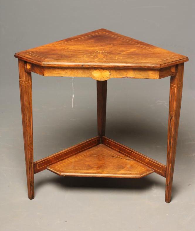 A LATE VICTORIAN ROSEWOOD CORNER TABLE of canted form with stringing Image
