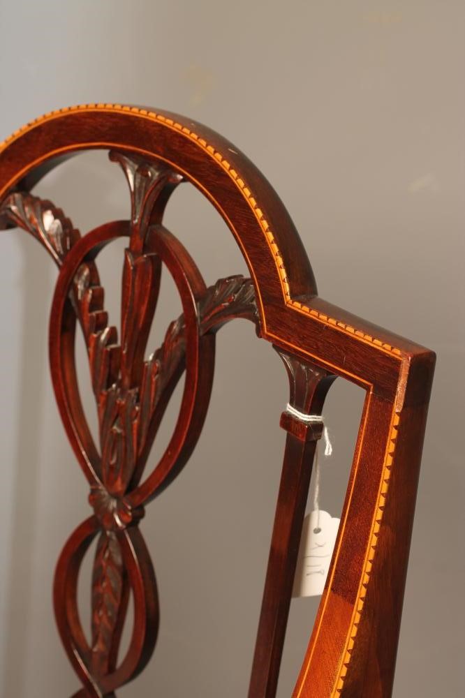 AN EDWARDIAN MAHOGANY ELBOW CHAIR by Marsh Image