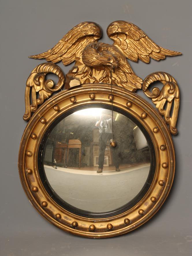 A REGENCY CONVEX MIRROR Image