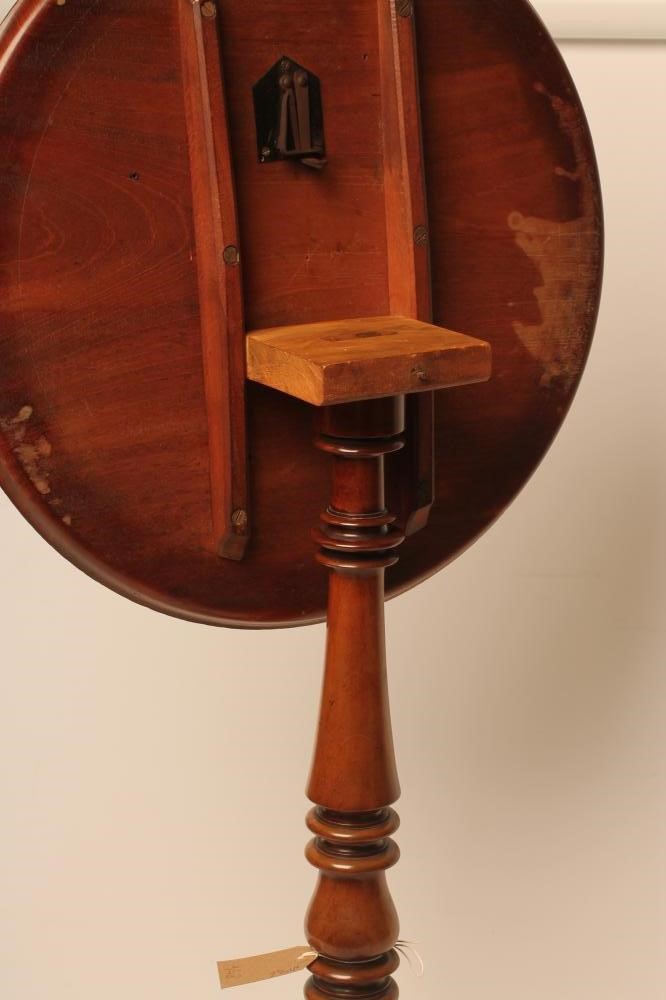A MAHOGANY TRIPOD TABLE Image