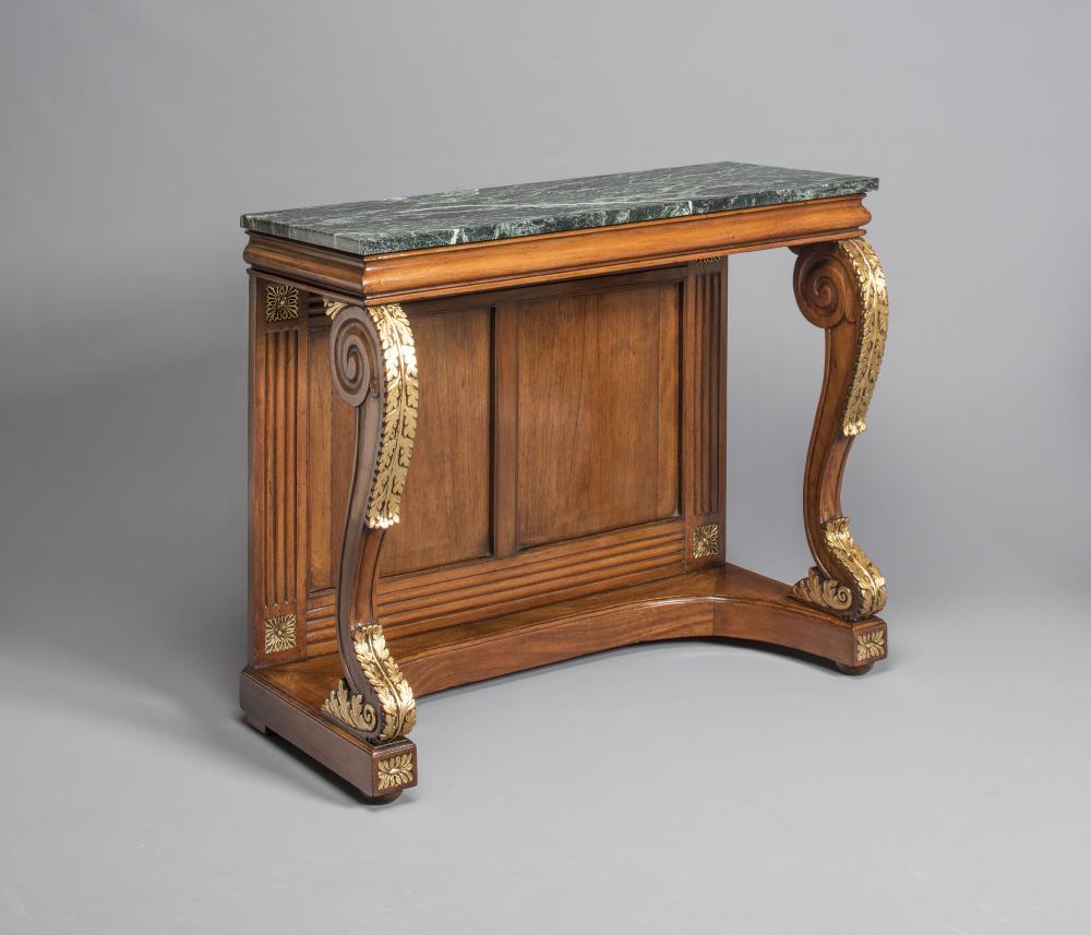 A GEORGIAN MAHOGANY AND PARCEL GILT CONSOLE TABLE Image