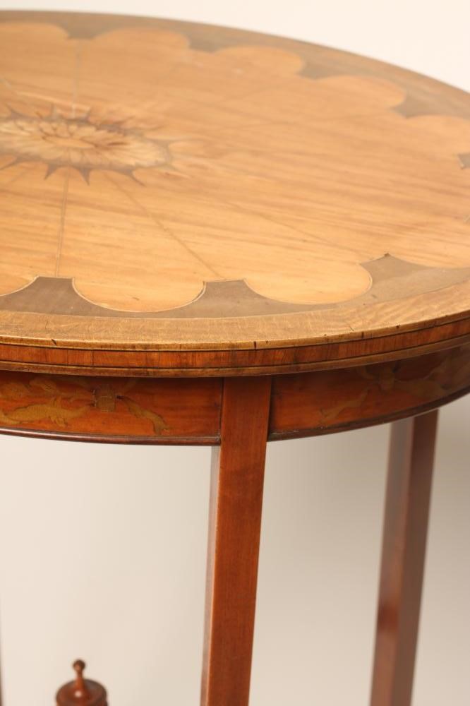 AN EDWARDIAN INLAID SATINWOOD OCCASIONAL TABLE of oval form Image