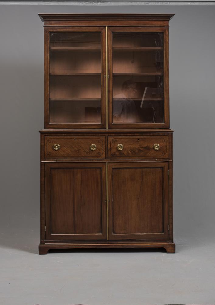A REGENCY MAHOGANY TWO STAGE BOOKCASE Image