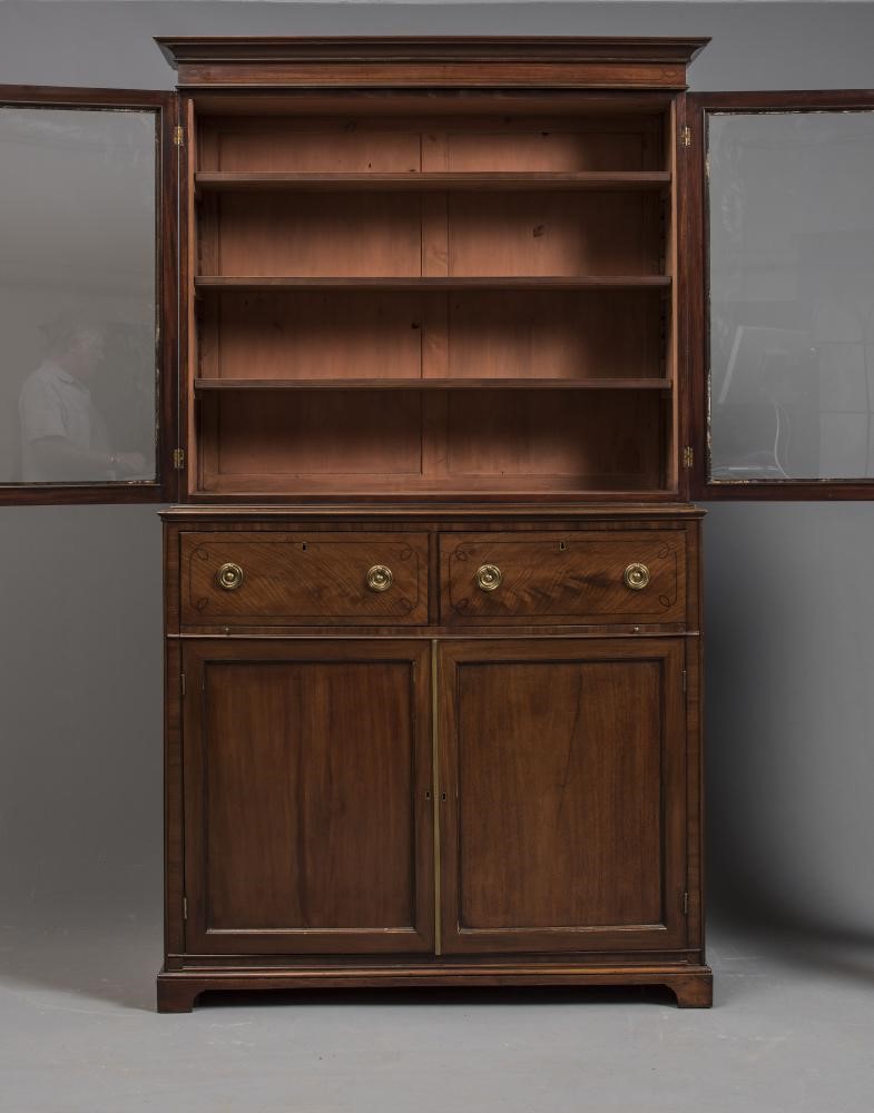 A REGENCY MAHOGANY TWO STAGE BOOKCASE Image