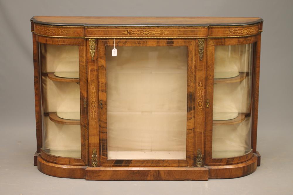 A VICTORIAN WALNUT CREDENZA of breakfront D form with marquetry foliate panels Image