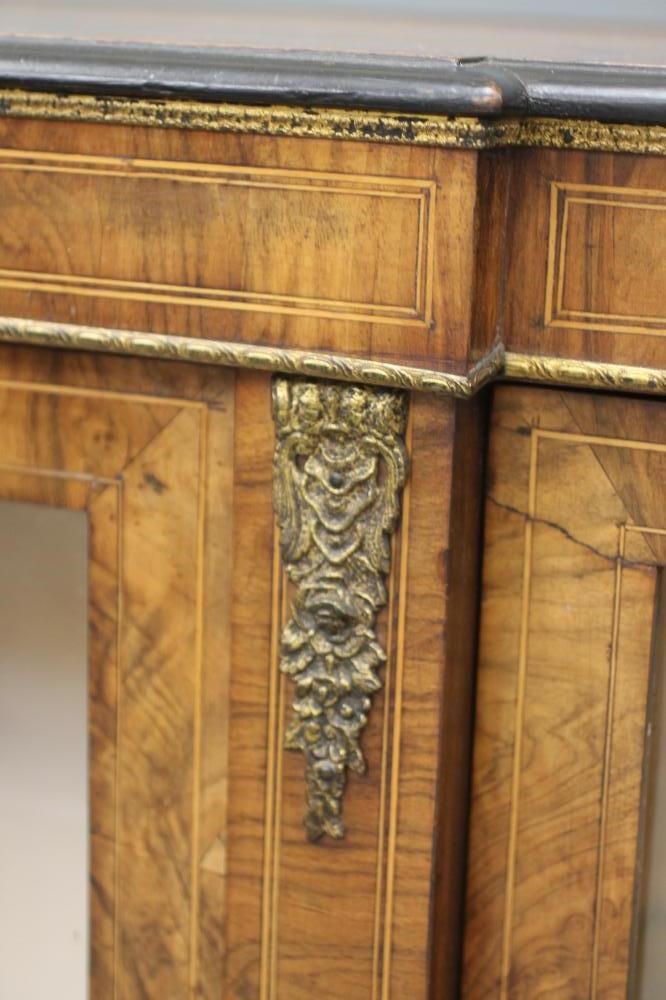 A VICTORIAN WALNUT CREDENZA of breakfront D form with marquetry foliate panels Image