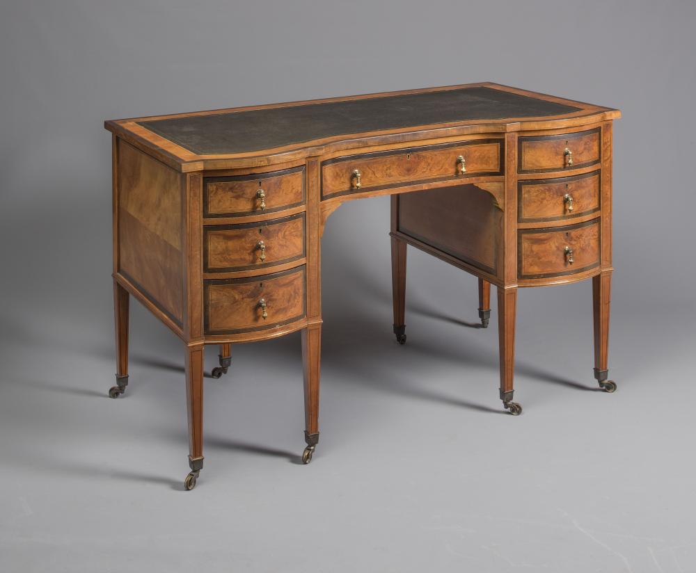AN EDWARDIAN SATINWOOD DESK with stringing and ebony trim Image