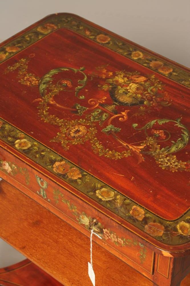 AN EDWARDIAN PAINTED MAHOGANY SIDE TABLE of rounded oblong form with stringing Image