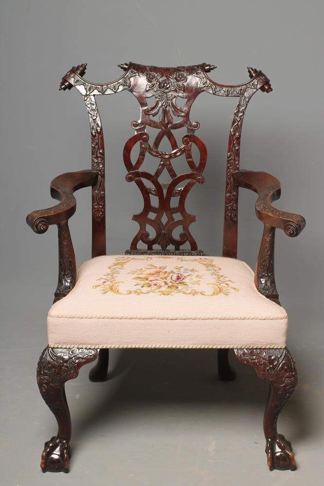 A GEORGIAN ROCOCO STYLE MAHOGANY ELBOW CHAIR Image