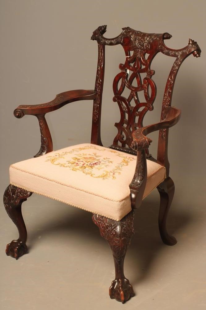 A GEORGIAN ROCOCO STYLE MAHOGANY ELBOW CHAIR Image