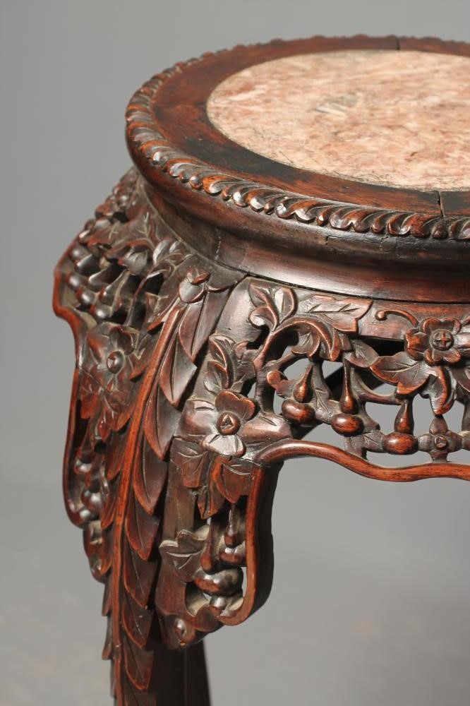 A CHINESE PADOUK WOOD JARDINIERE STAND Image