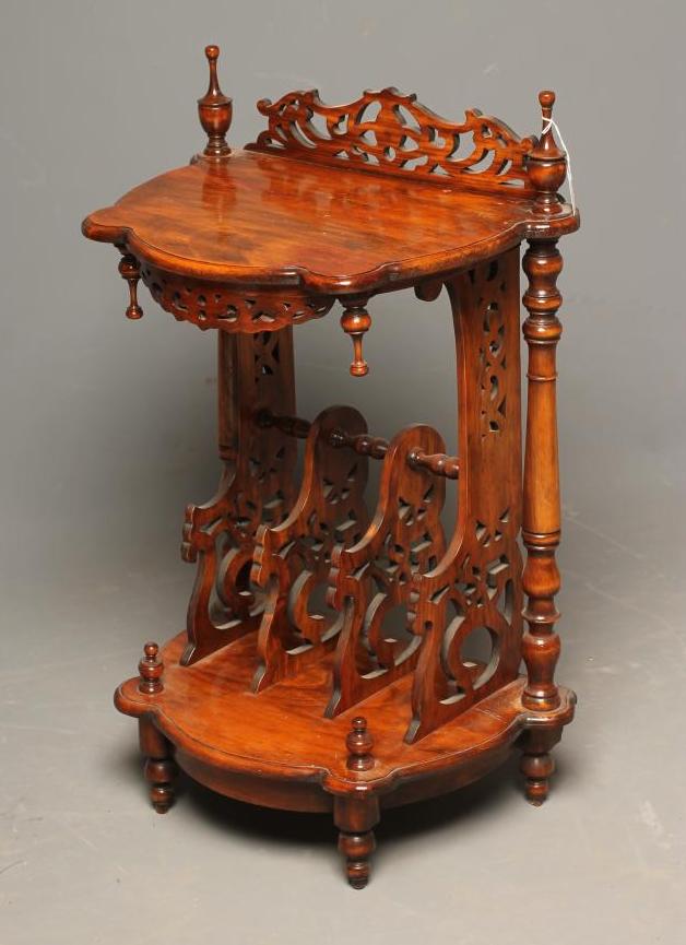 A VICTORIAN WALNUT CANTERBURY of shaped D form Image