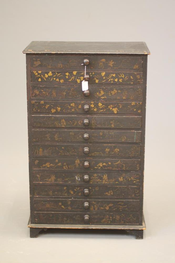 A LATE VICTORIAN EBONISED PINE SPECIMEN CHEST of oblong form gilded with chinoiserie flowers and Image