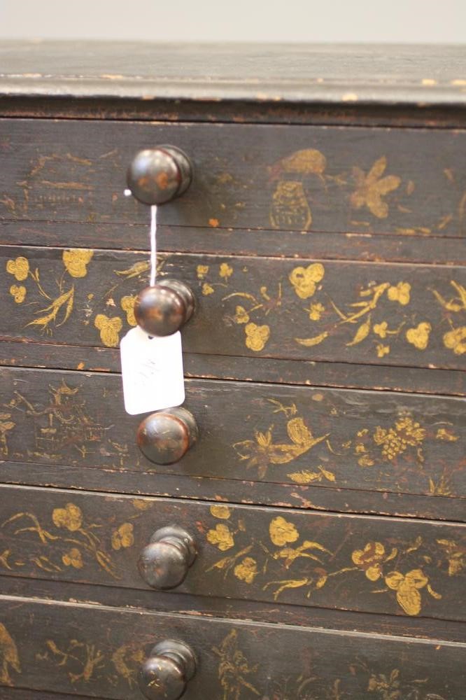 A LATE VICTORIAN EBONISED PINE SPECIMEN CHEST of oblong form gilded with chinoiserie flowers and Image
