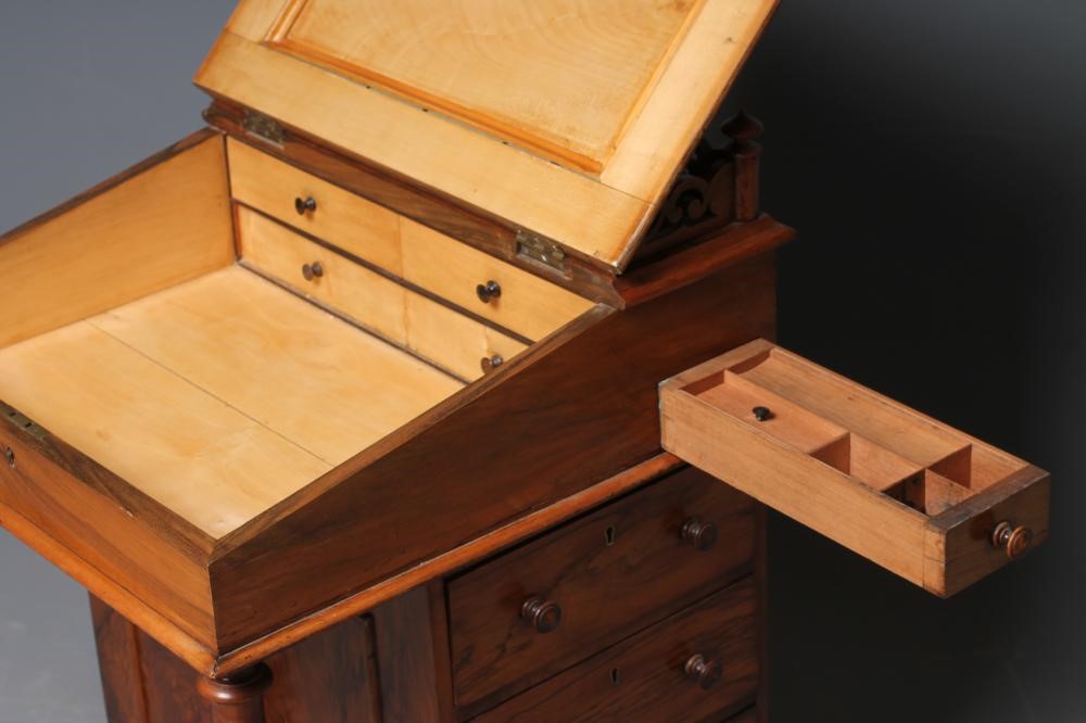 A VICTORIAN WALNUT DAVENPORT Image