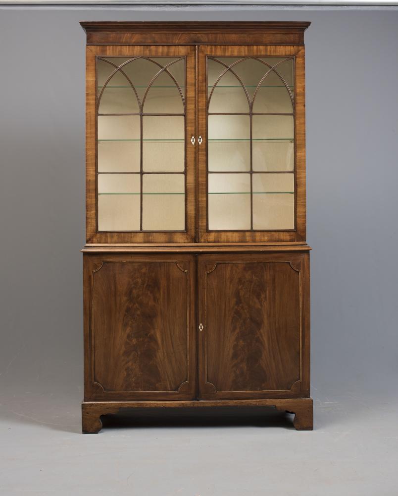 A GEORGIAN MAHOGANY TWO STAGE BOOKCASE Image