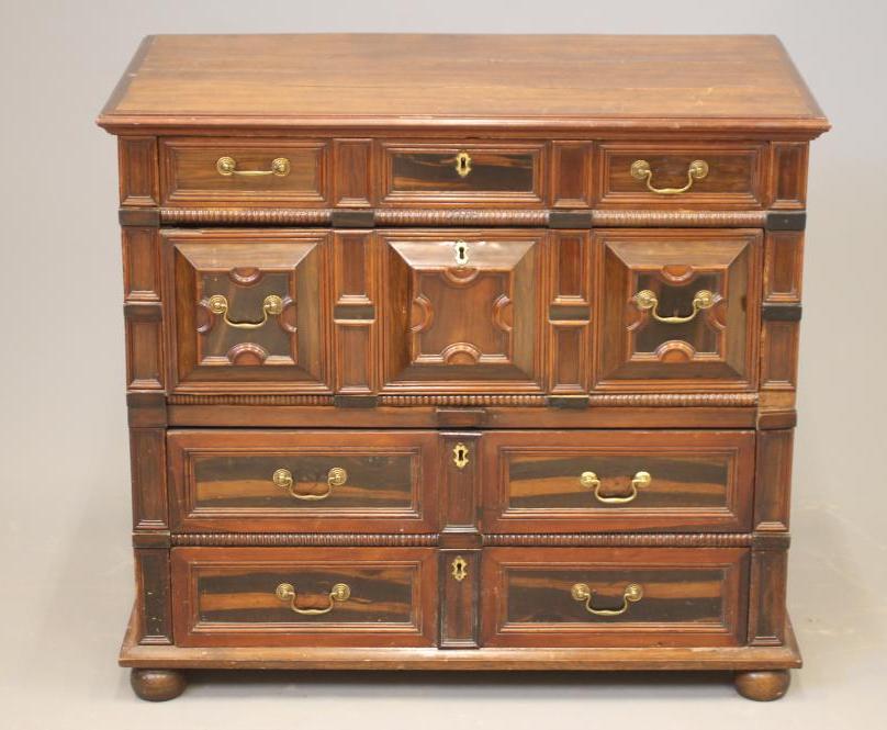AN OAK GEOMETRICALLY MOULDED CHEST of 17th century design Image