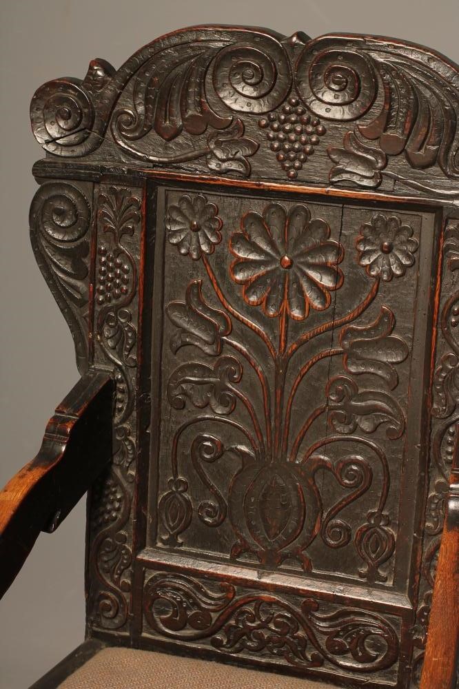 A JOINED OAK ARMCHAIR Image