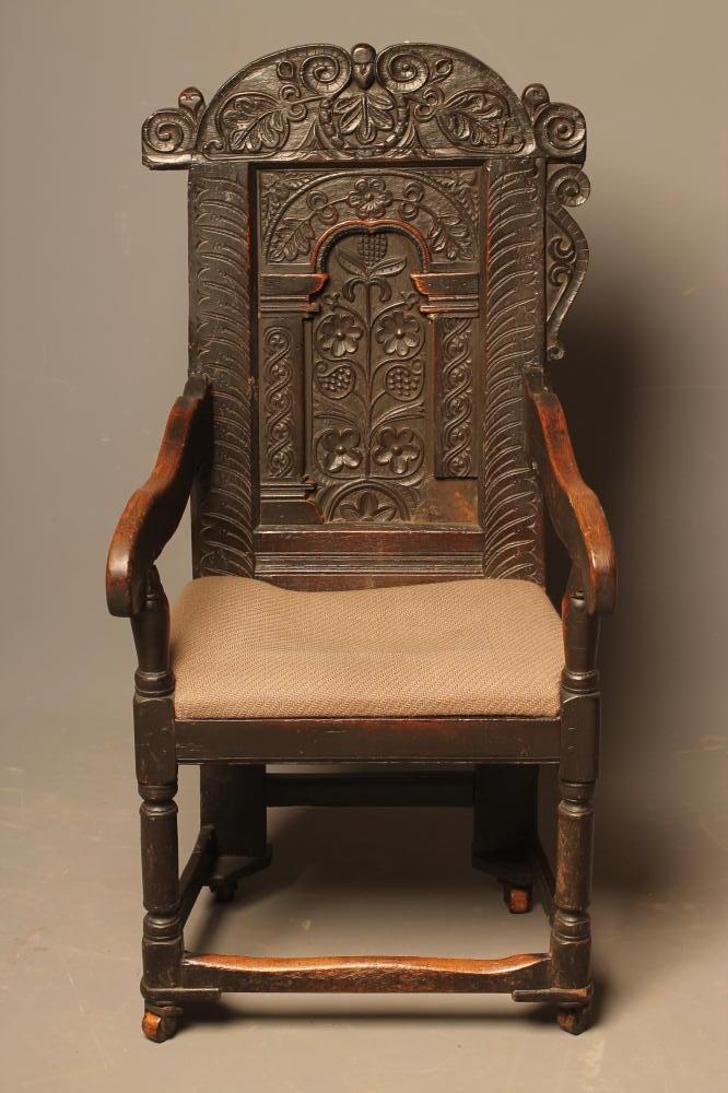 A JOINED OAK ARMCHAIR Image