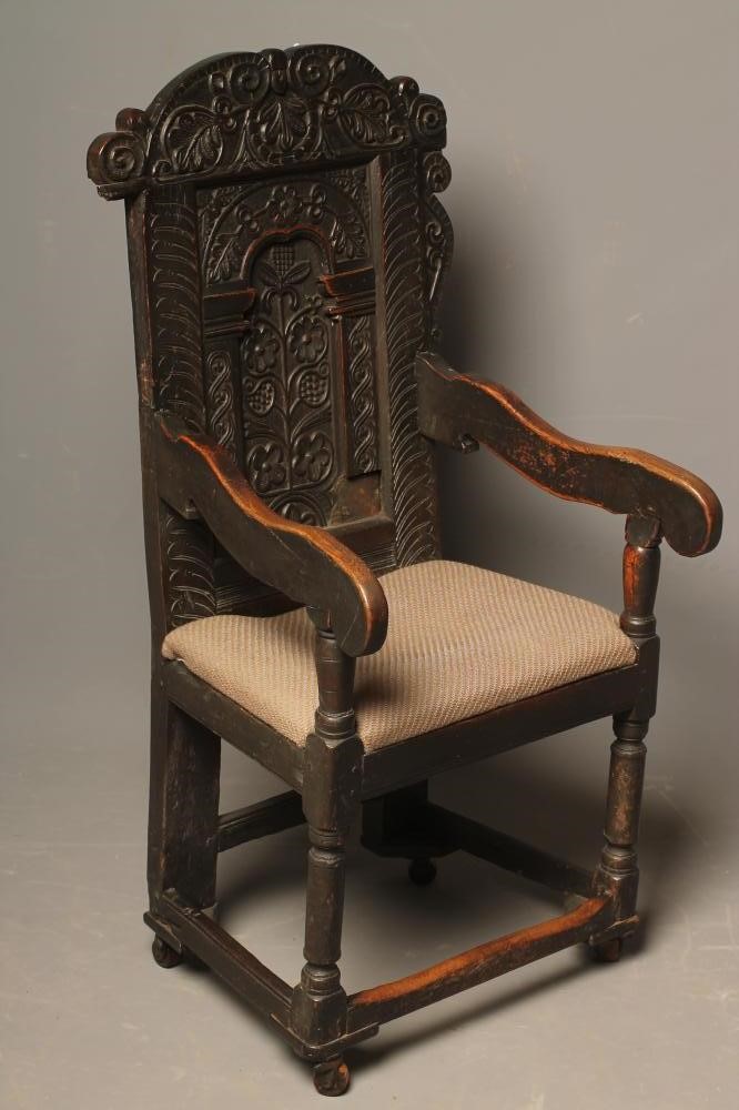 A JOINED OAK ARMCHAIR Image