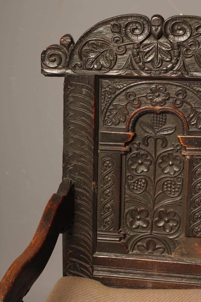 A JOINED OAK ARMCHAIR Image