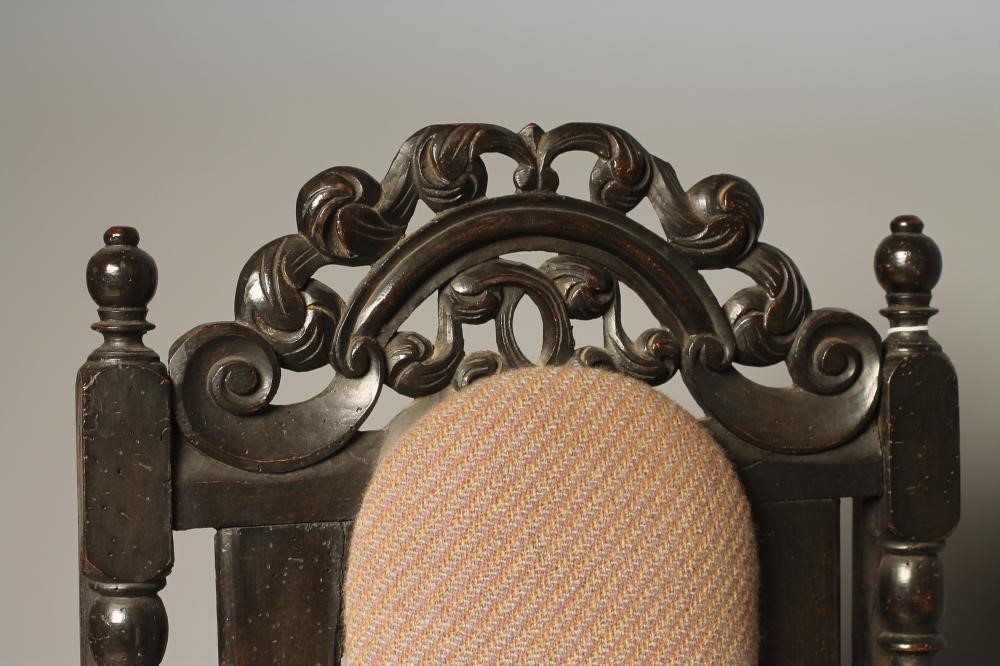 A  WALNUT ARMCHAIR Image