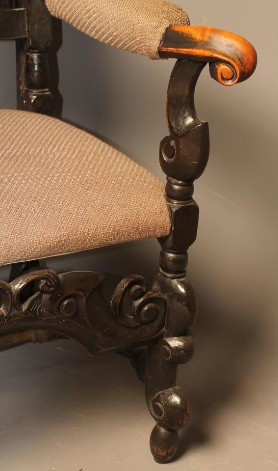 A  WALNUT ARMCHAIR Image