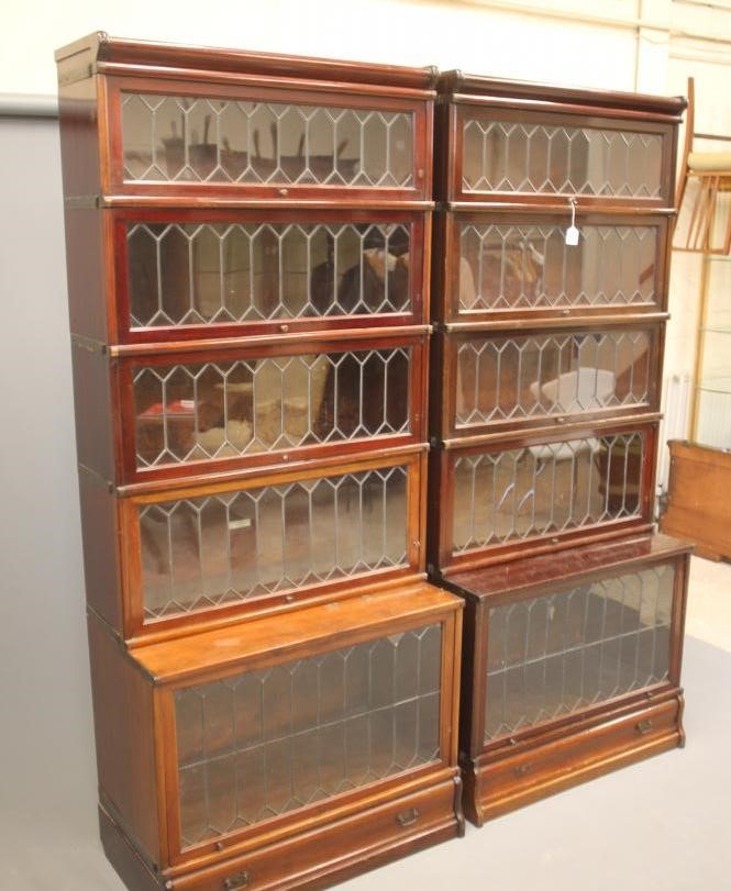 A PAIR OF GLOBE WERNICKE MAHOGANY SECTIONAL BOOKCASES Image