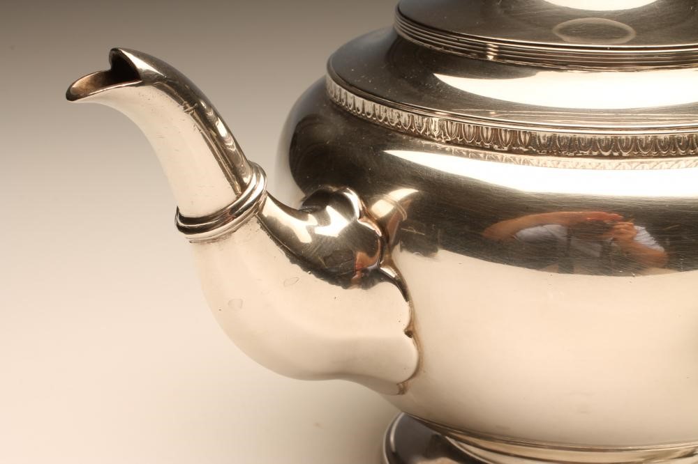 A THREE PIECE SILVER TEA SERVICE Image