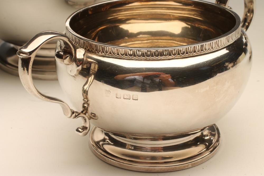 A THREE PIECE SILVER TEA SERVICE Image