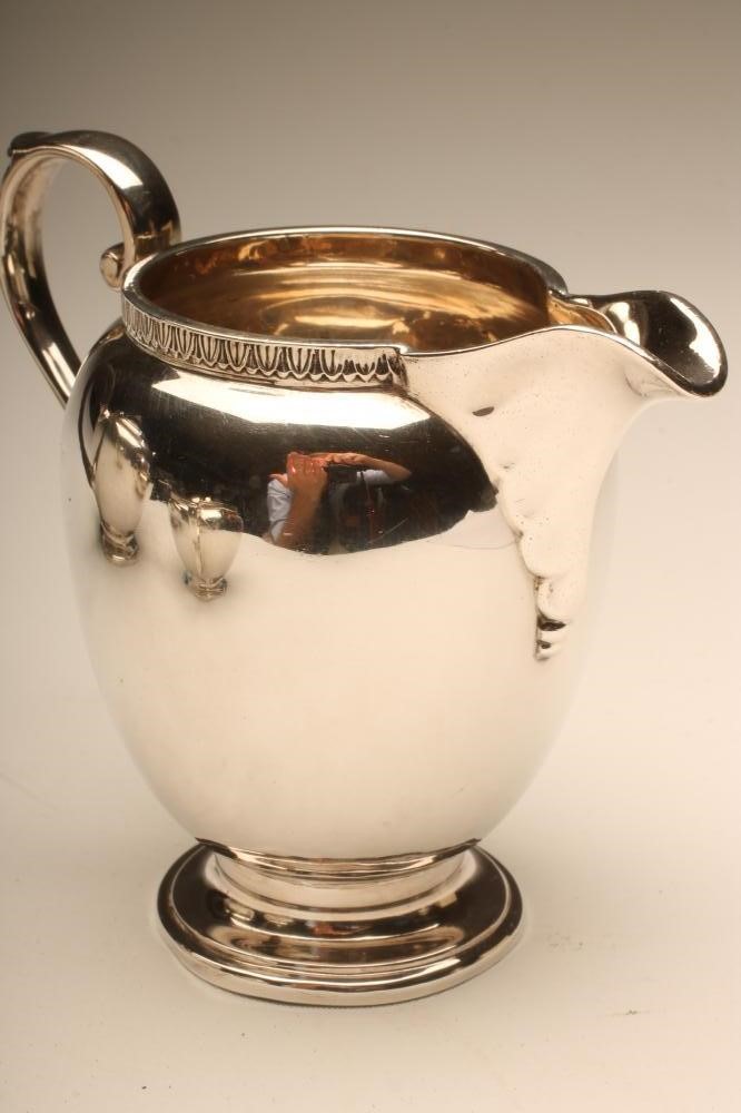 A THREE PIECE SILVER TEA SERVICE Image